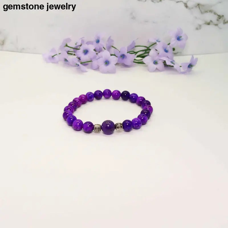 Sugilite and Amethyst gemstone harmony bracelet with silver spacers, handcrafted in Port Saint Lucie, Florida.