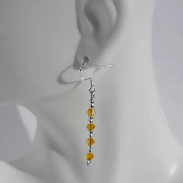 White Mannequin Bust with Sterling Silver Hoop Earrings and Blue Crystals - Yellow - earrings